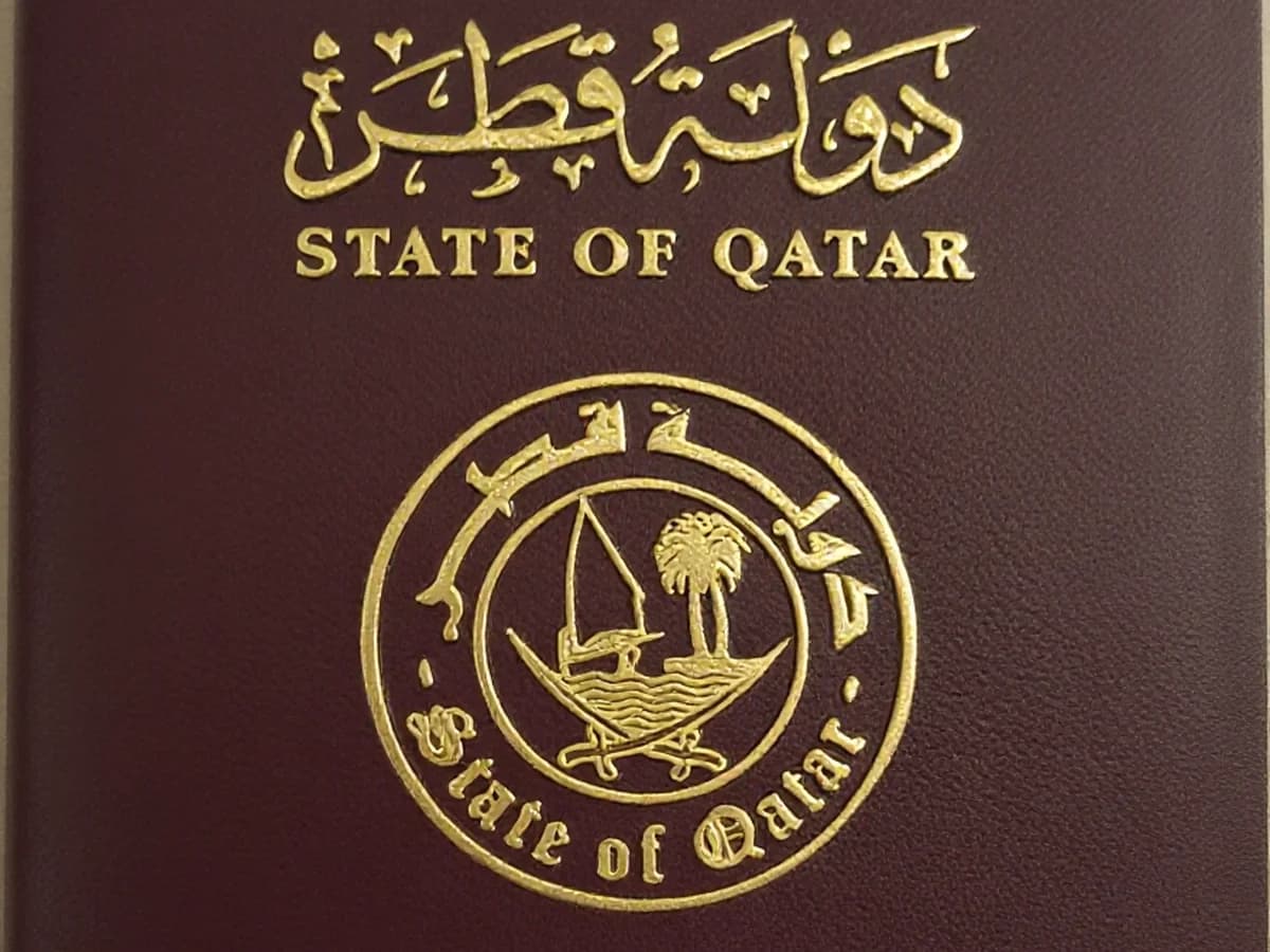 Cover of a State of Qatar passport, representing the General Directorate of Passports and travel document services handled at the Ministry of Interior complex near Duhail
