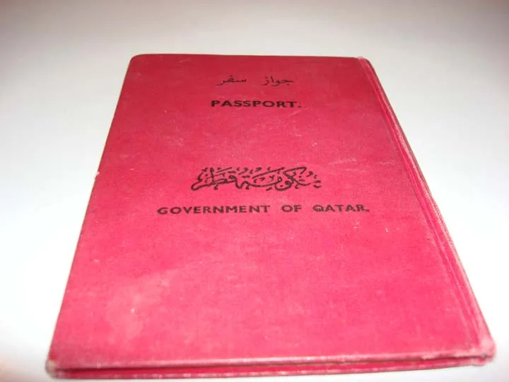 Cover of a 1968 Government of Qatar passport, the type of travel document issued by the Nationality and Travel Documents Department