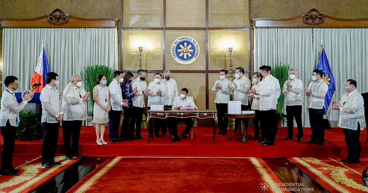 Signing ceremony of Republic Act 11641, the Department of Migrant Workers Act, which renamed POLO offices as Migrant Workers Offices